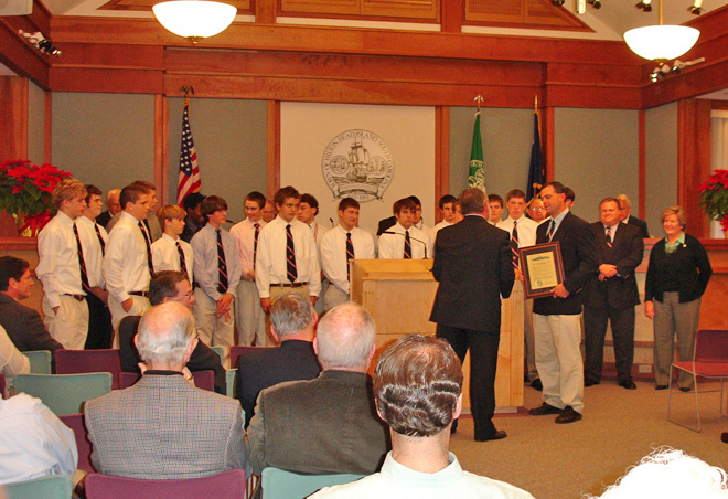 Football team receiving a Commendation from Mayor Peeples