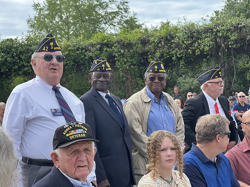 Veterans standing at the Ceremony